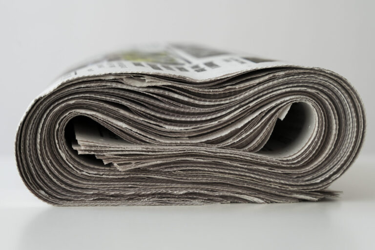 Rolled up newspaper